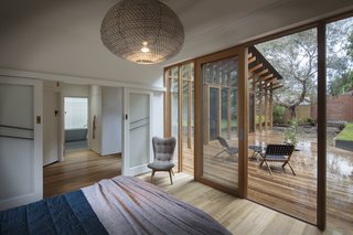 One of the home's two bedrooms looks out on to the oversized deck. 