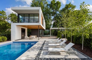 The 4,500-square-foot property is made up of three pavilions. The first pavilion is the garage, the second is for the living areas, and the third is for the master suite. 