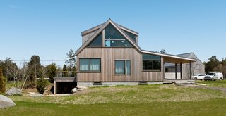 "We took a 1970s kit greenhouse off the west side of the house, which was making the home overheat, and replaced that area of footprint with a covered porch that shades the western glass," Thompson says.