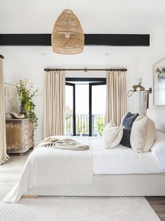 "I remove a lot of the day-to-day items people use because they typically are utilitarian and don't add much to the photo except visual clutter," Neustadt says. "This includes items like dish soap, remote controls, blenders, waste baskets, and tissue boxes."