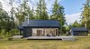 Modern home with Outdoor. A series of French doors extends interior living spaces to the deck and meadow beyond. Photo 2 of la casa que vull
