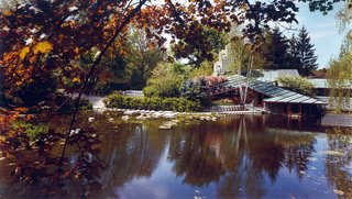The Alden B. Dow Home and Studio in Midland features a sunken parlor that is level with an expansive pond. The Japanese-style landscaping embodies Dow’s philosophy that "gardens never end and buildings never begin."