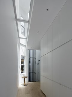 A Historic Victorian in San Francisco Is Meticulously Transformed Into a Modern Family Home - Photo 15 of 26 - A walkable glass skylight filters light to the second floor.