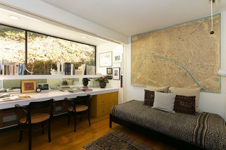 An Amazing Tree-Covered Glass House For Sale in the Berkeley Hills - Photo 19 of 20 - A flexible bedroom/office includes a built-in desk and bookcases.