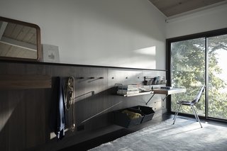The panel-based storage system creates a feeling of refined openness while adding a high-quality, finished look.<cite data-placeholder="true">Add credit</cite>