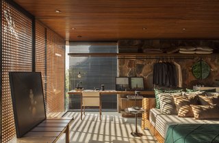 An Incredible Brazilian Home That Celebrates Art, Travel, and Nature - Photo 9 of 14 - The client "wanted everything to communicate without the need for doors in the internal environments," says architect Filipi Oliveira. 