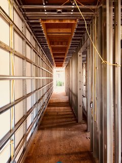 Dan Brunn Architecture and Dwell Break Ground on Bridge House in L.A. - Photo 6 of 6 - With the help of BONE Structure's steel framework, electrical wires can be easily routed through pre-cut openings.