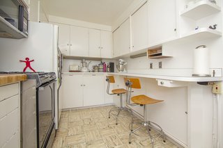 Cozy and charming, the house's original kitchen remains intact.