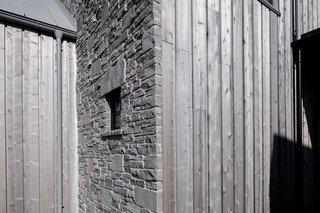 The locally quarried stone, along with locally milled cedar, plays a prominent role in the materials profile throughout the home. Investing in local tradespeople was an important priority for both the homeowners and design team – beyond simply creating a place of beauty, they felt it was important to support the local economy, while investing in quality construction that would last.