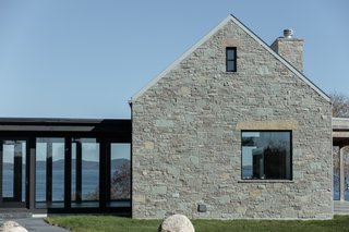 Imagining a second home as a cottage retreat gave the team the creative opportunity to "think about how you want to live in comparison to how you’re living," says Adair. To their clients, this meant centering their daily experience around family, nature, and socialization – emphasizing simplicity and cutting out excess.