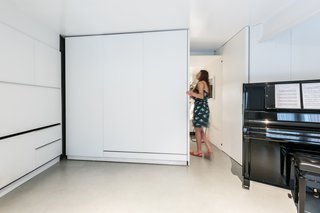 The bedroom facing the street and adjacent to the home's only windows was a natural spot for Pilar's son Guillermo. Since Guillermo would only be visiting intermittently, the bedroom wall could be kept open most of the time, allowing unrestricted light to penetrate deep into the interior space.