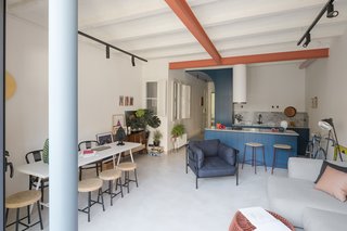"I love traveling and recollecting a lot of memories from my journeys," says Serboli. "I believe that all of this has influenced the design of the apartment."<br> "Consciously, I wanted to expose some objects and already knew where to put them before I even had bought the apartment," he explains. "In an unconscious way, funnily enough, a couple of months after the end of the work, I found a forgotten photo of a trip to Mozambique, of me in a colonial house with small blue round columns, ivory floor and coral-colored doors."<cite>Roberto Ruiz</cite>