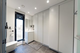 Coodo 64's bathroom has built-in storage. 