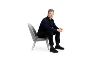 Designer Hans Hornemann on the Ace Lounge Chair. 