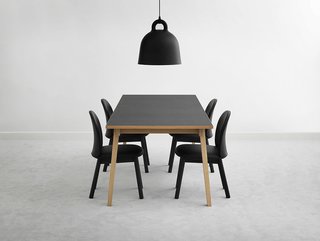 The Ace chair in a dining room arrangement.