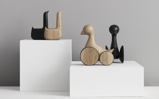 Swan and Ducky figures in natural and black oak. 