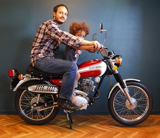 Marc Venot together with his son on his Honda from 1974.