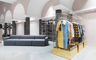 Selected fashion items next to the modular Rope sofa.