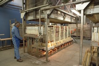 One of two natural gas-fueled dinnerware kilns (called top-hat kilns) loaded and ready to go.