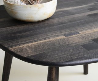 Expert craftsmanship is evident in the details of this patchwork tabletop, shown here in Oxidized Oak. With a sleek, simple shape, it’s designed to let the beauty and variety available from a single wood species take center stage.