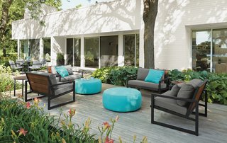 Montego sofa with cushions, Montego lounge chair with cushions, Boyd round ottoman, solid outdoor pillows