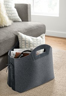 Use an unusual basket or tote as both an organizational tool and statement piece. The tote stands upright so you can easily place it next to your sofa or under your desk.