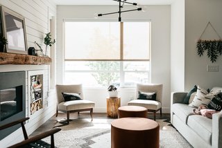 Edwin chairs, leather round Aero ottomans, Ian sofa 