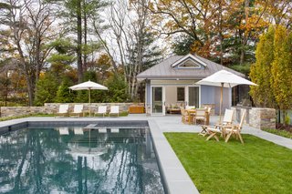 Historic Massachusetts Home Uses Modern Pendant Lights in Pool House - Photo 3 of 3 -