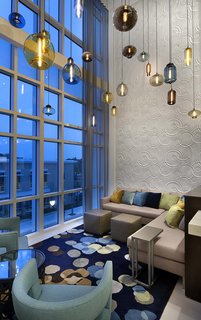 Modern Hotel Lighting Adorns Lobby of Hilton Resort in Myrtle Beach - Photo 2 of 4 -
