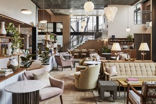 The light-filled lobby, located in the basement, is at once industrial and warm.
