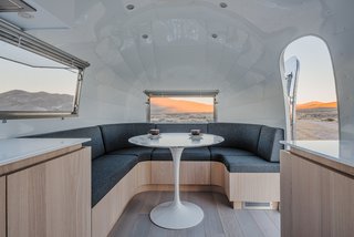 The Airstream's meeting area is marked by an Eero Saarinen-designed Tulip table.