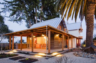 The nearly 100 year-old Victorian farmhouse clearly had good bones, but over the years unfortunate facelifts and additions had left it somewhat listless as well as thermally challenged in both summer and winter. The design team approached the project with the sensibility that the original Victorian had a certain charm and should remain essentially unchanged, but that the renovated kitchen and dining room addition should have an open ‘Zen’ feeling through a connection to the surrounding garden.