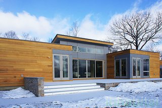 10 Prefabs Found on the East Coast - Photo 7 of 10 - The "Breezehouse" is a 2,420-square-foot prefab home by Blu Homes in the Hudson Valley. The soaring ceilings and open floor plan allow for spacious, light-filled rooms. 