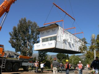 The Palisades Prefab being lowered into place. 