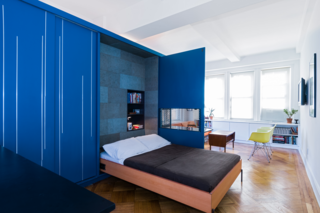 MKCA's (Michael K. Chen Architecture) refurbishment of this 420-square-foot apartment literally unfolds. Instead of dividing the unit into smaller spaces, he used a single piece of furniture to reconfigure and subdivide the space. 