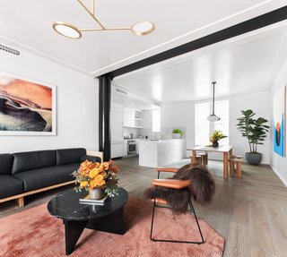 Matter Made's Affordances Coffee Table designed by Jonathan Zawada takes center stage in the well-appointed living space. 