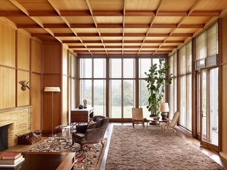 Spotlight on John Yeon, the Father of Northwest Regional Architecture - Photo 4 of 14 - Shown here is an interior view of the living room of the Watzek House. The home features small spaces that open into vast ones—all with unique details including wall panels that conceal hidden closets. 