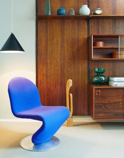 A royal blue Panton 1-2-3 Lounge Chair completes the Collector's Suite. All of the furniture in this space is for sale. 