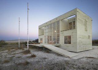 Klotz's first commission was the privilege of designing a beach home for his mother, who had inherited a bit of money after separating from his father. With a limited budget and a somewhat remote beach locale, Klotz created low-maintenance refuge—which he initially sketched on graph paper while on a flight. His mother loved it, and the architect claims, "To date, it is the only project I have completed without making changes." He describes, "The project served and continues to serve as a starting point and endpoint insofar as it represents what I consider to be the essential aspects of a building."
