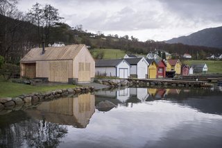 A New Book Examines the Art of Breathing Life Into Forgotten Architecture - Photo 11 of 16 - Koreo Arkitekter + Kolab Arkitekter created a modern boathouse out of local timber in Vikebygd, Norway, which fits naturally into the traditional context of its location. 