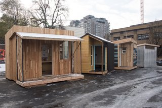 PODs designed by SERA Architects, Portland State University, LRS Architects, and Mackenzie on display in downtown Portland. The architect-designed units humanized the project, leading people to even think "I could live in that." 
