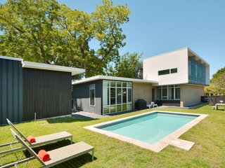 Feel at Home While Exploring Austin at One of These Modern Short-Term Rentals - Photo 6 of 17 - Designed by Austin-based architect Kevin Atler, this customized contemporary home is located in the heart of South Congress (SoCo) and features a grassy backyard with a pool. 