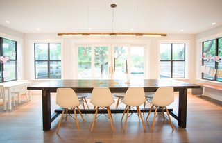 Feel at Home While Exploring Austin at One of These Modern Short-Term Rentals - Photo 11 of 17 - The beautiful chef's kitchen offers views of the half-acre backyard, which is complete with an organic garden. 