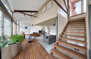 The feeling of space and openness is enhanced by carefully placed internal and external glazing, allowing for views in multiple directions.