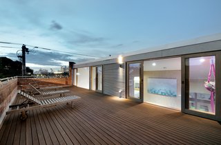 The home's roof-deck offers stunning views of the Australian city. 
