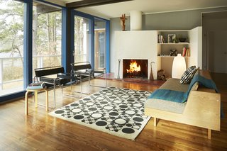 The fireplace is similar to the one in Breuer’s nearby cottage, and is slightly askew.