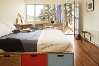  The bedroom opens to the wrap-around deck. 