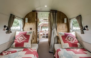 Live the Airstream Life Vicariously With a New Book That Celebrates the Timeless Trailers - Photo 9 of 19 - The design brief for this 1964 Airstream Overlander restored by ARC Airstreams was "luxury with a country feel." Ralph Lauren’s Corral Canyon fit the bill. 