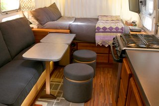 Live the Airstream Life Vicariously With a New Book That Celebrates the Timeless Trailers - Photo 6 of 19 - Storage is always high on the priority list for any Airstreamers, as is having a place to sit down. Rob and Katie combined the two, creating little storage containers that double as seating.