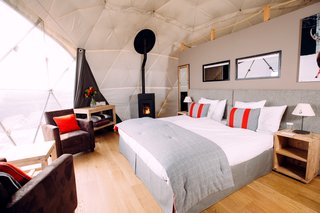 The interior decor is inspired by a modern glamping lifestyle.